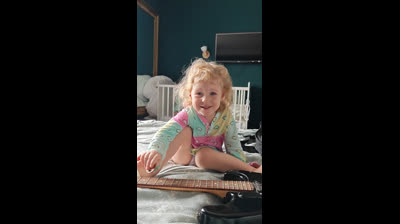 Aurora plays guitars